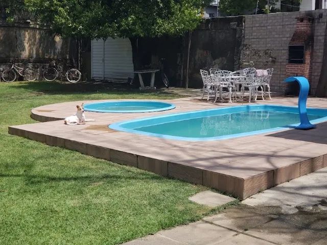 casa com piscina e churrasqueira, 3 quartos 550 diária