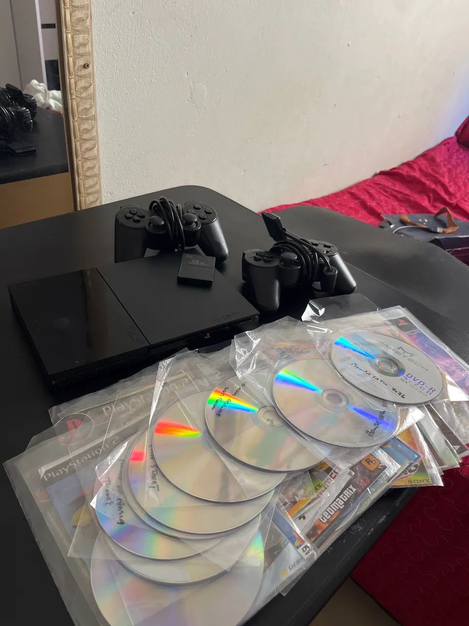 Ps2 Slim com LEITO DE DISCO + 2 controles + 30 jogos em DVD
