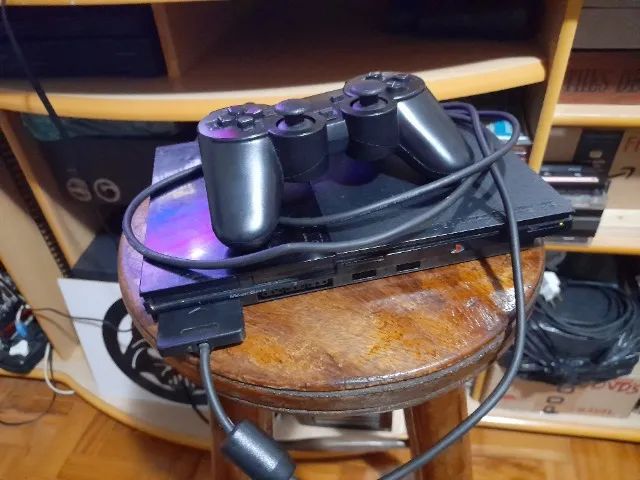 Vídeo Game Plastation ll Slim, 1 controle paralelo + cabo A/V + Cabo de força + 5 jogos pa