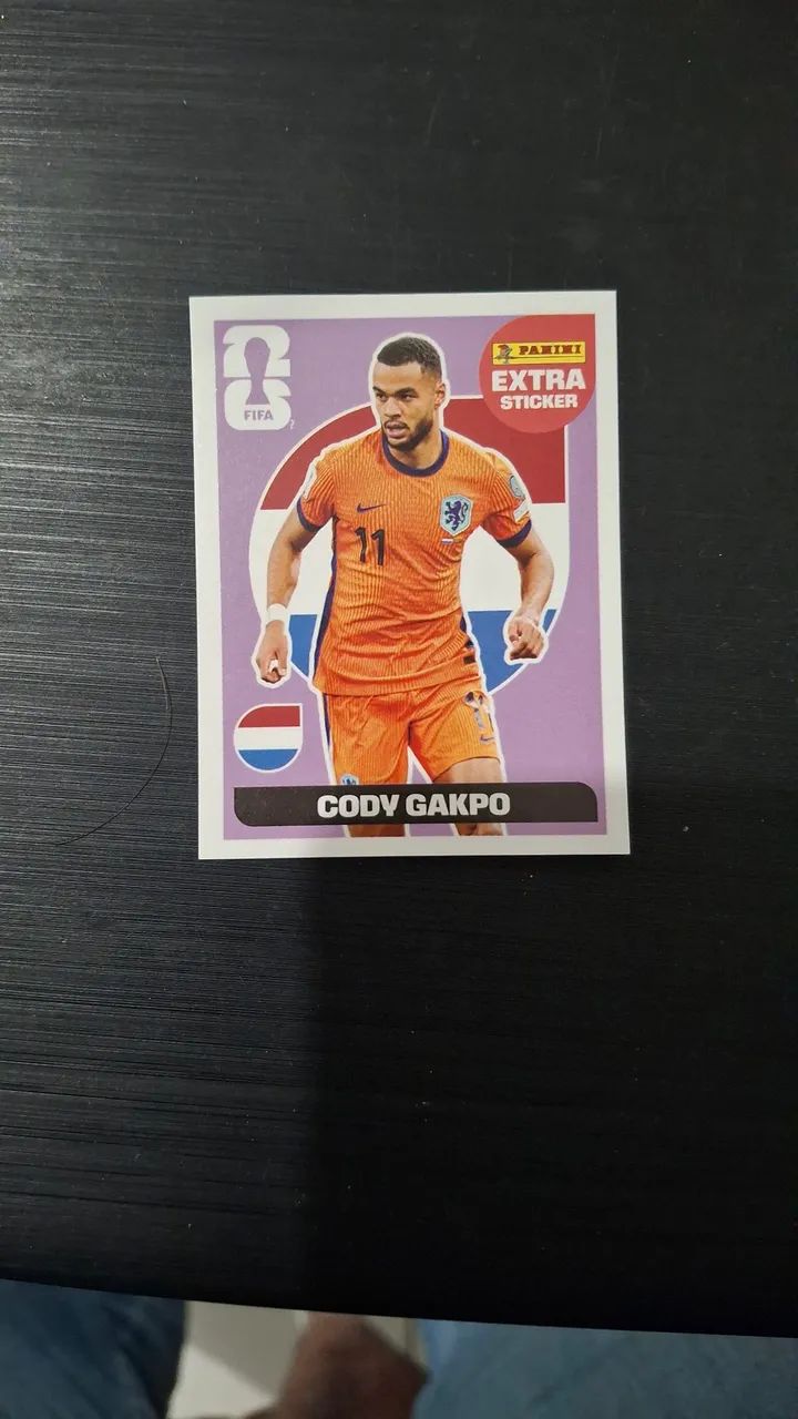 Figurinha Extra Cody Gakpo Roxa Copa do Mundo 2026 Oficial 
