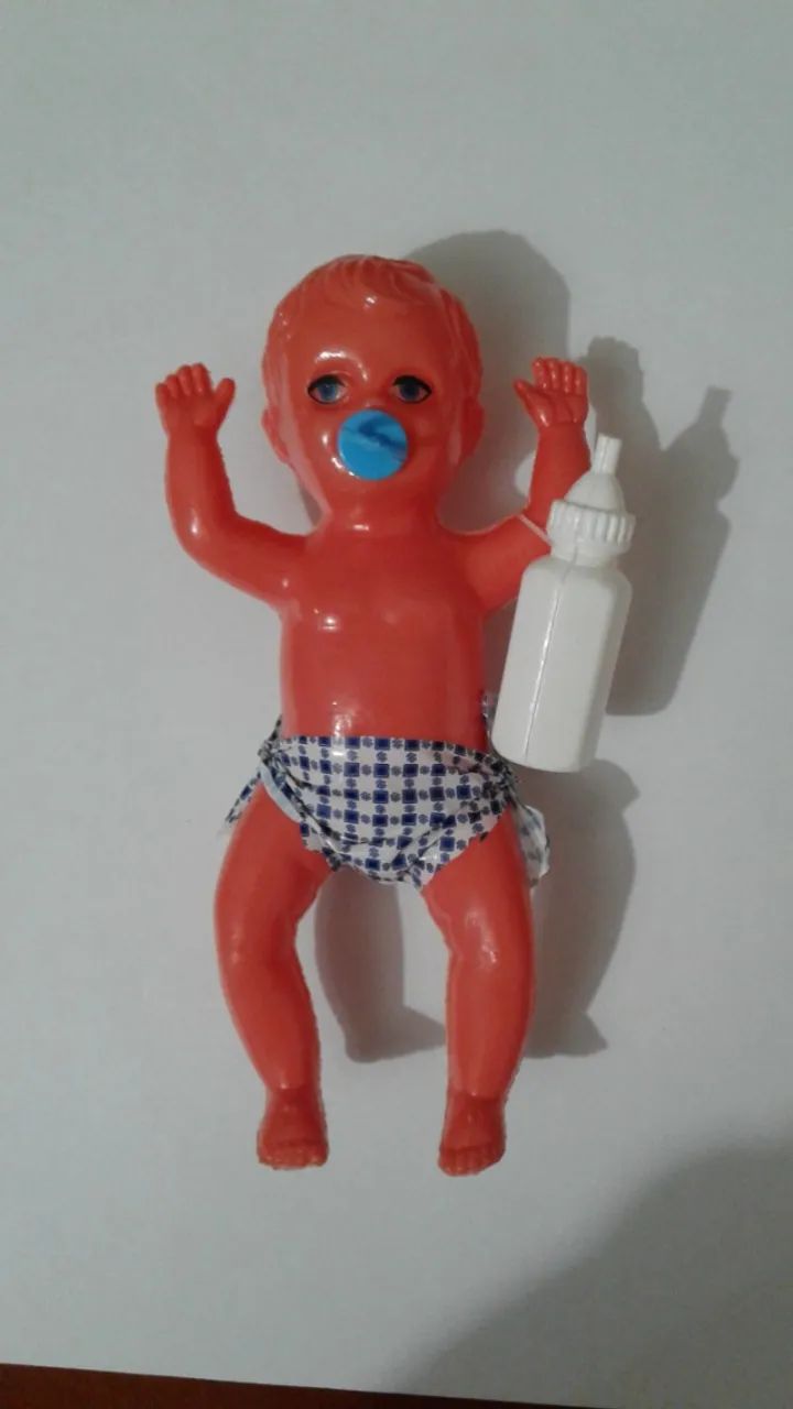 Boneco antigo Parapedro com chupeta e mamadeira