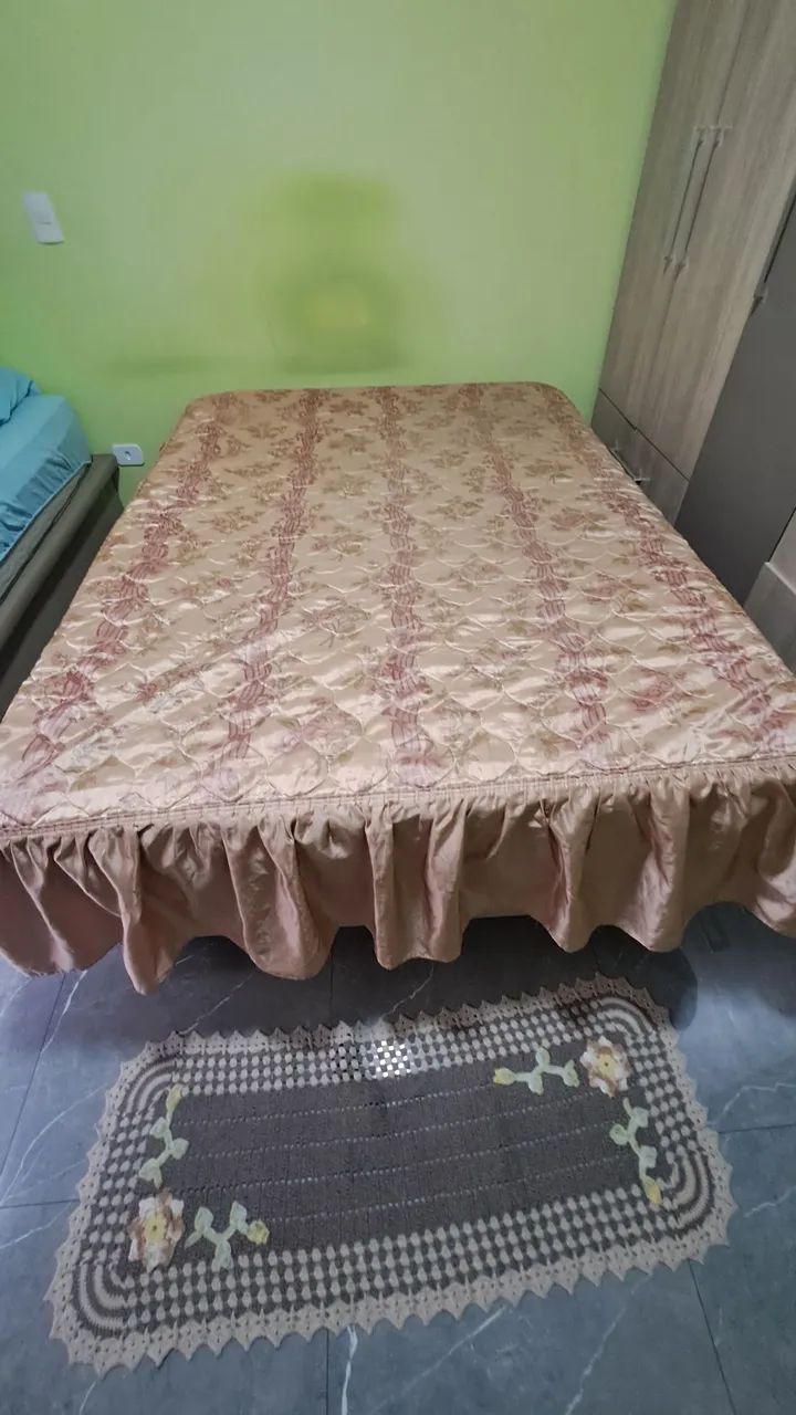 Colcha e lençol de casal