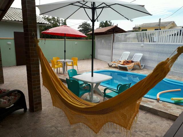 Belíssima casa com piscina em Matinhos - Foto 2