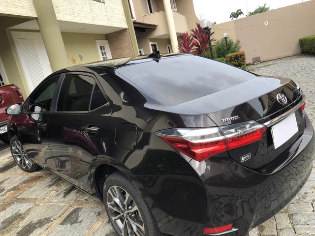 Vendo corola altis 2018 cor marrom estado de okm - Foto 6