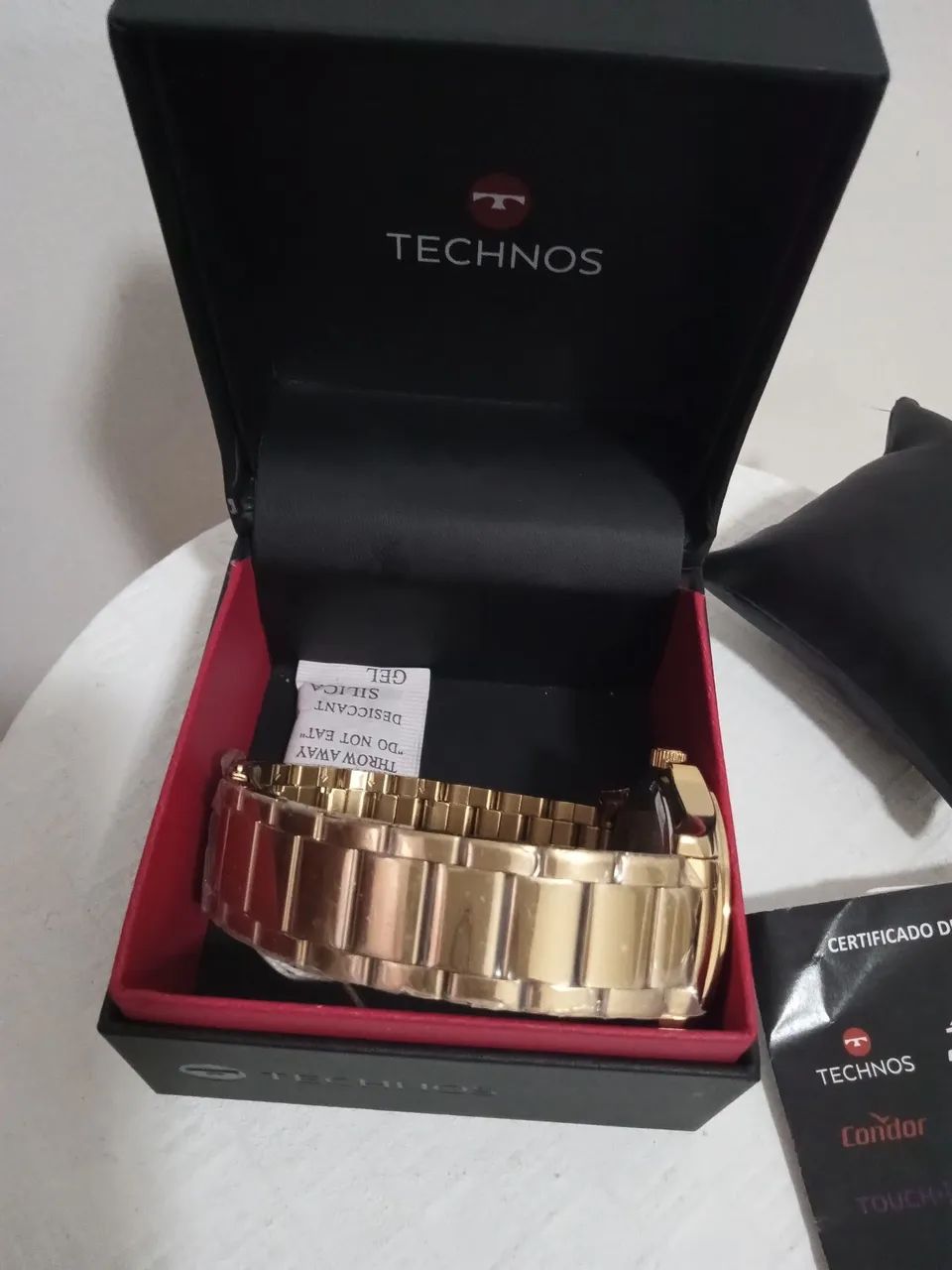 Vendo relógio technos pulseira de aço dourado aprova dágua novo.  - Foto 4
