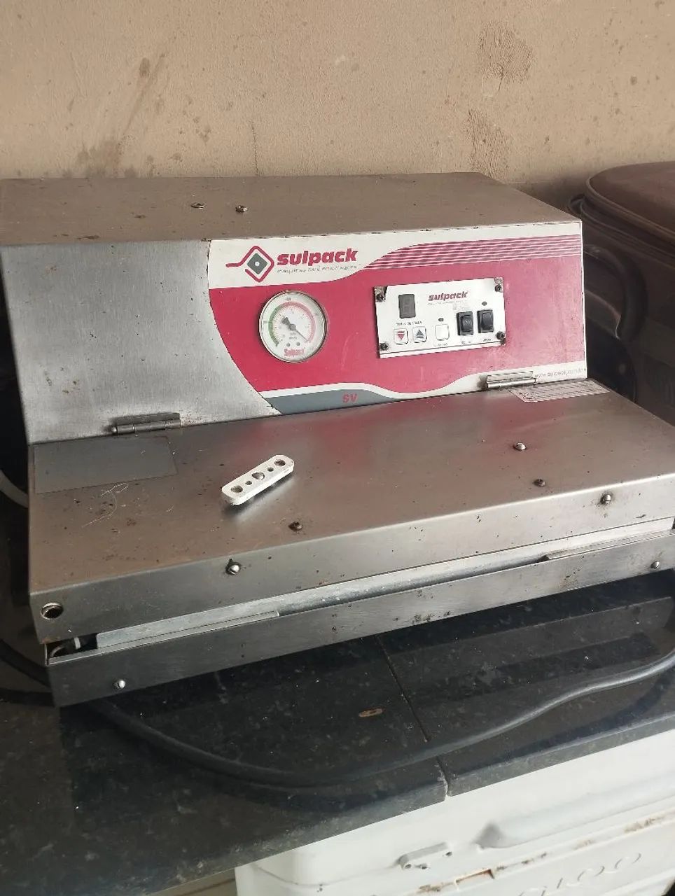 Máquina de embalar a vacuo