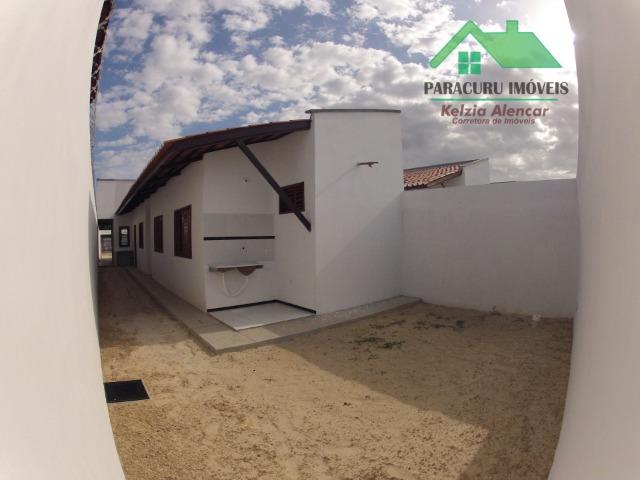 Ampla casa nova de três quartos financiada em Paracuru - Foto 13