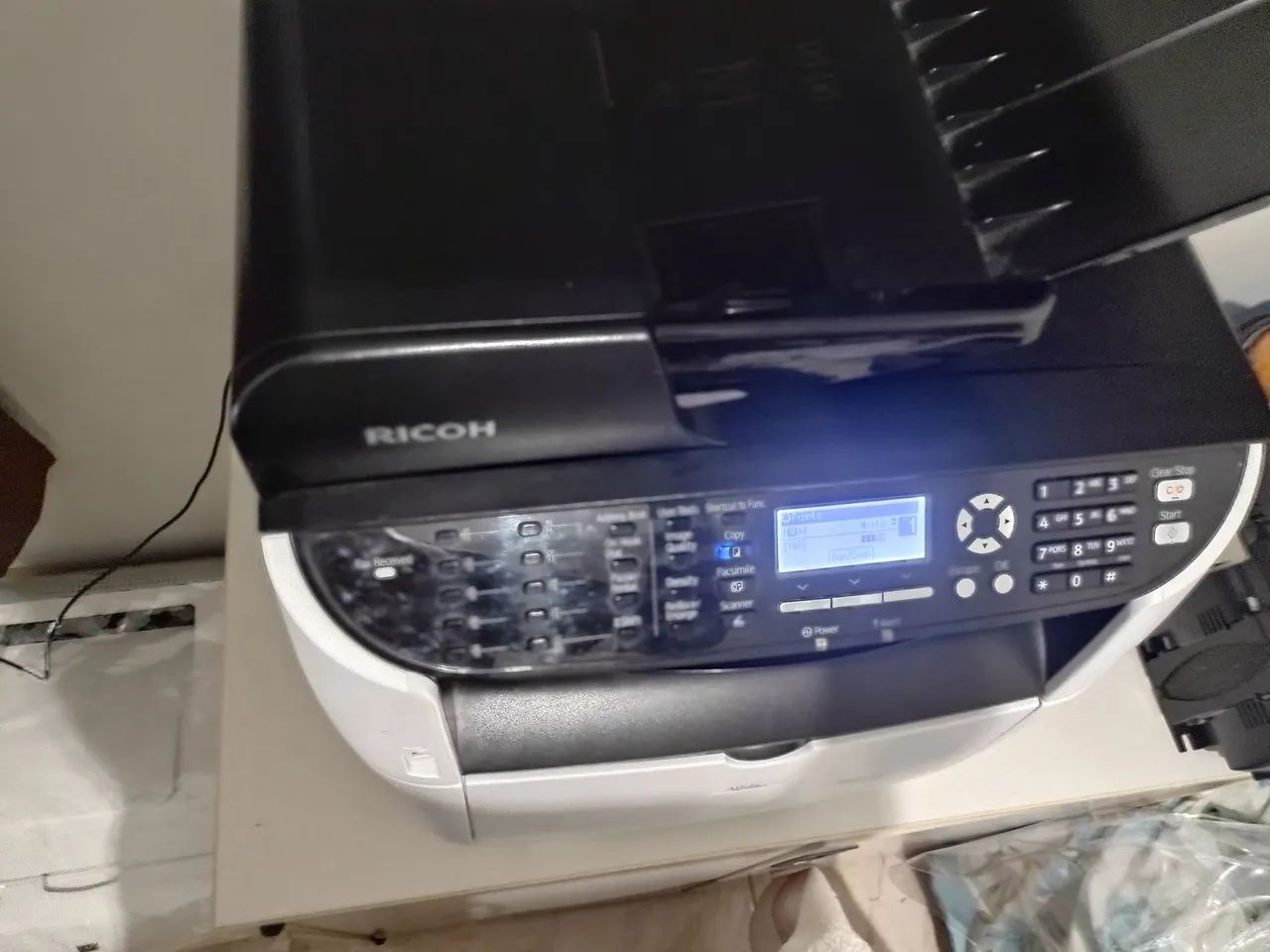 Impressora multifuncional laser Ricoh64607090682114122