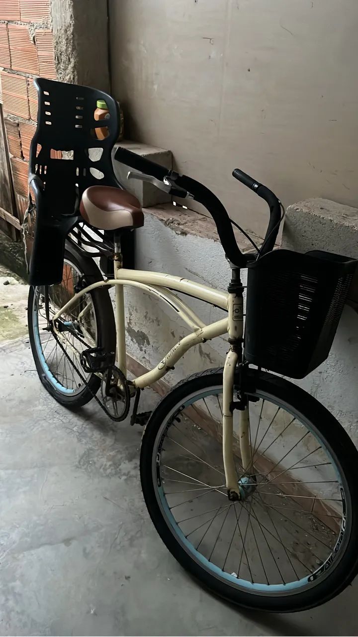 Bicicleta com cadeirinha 