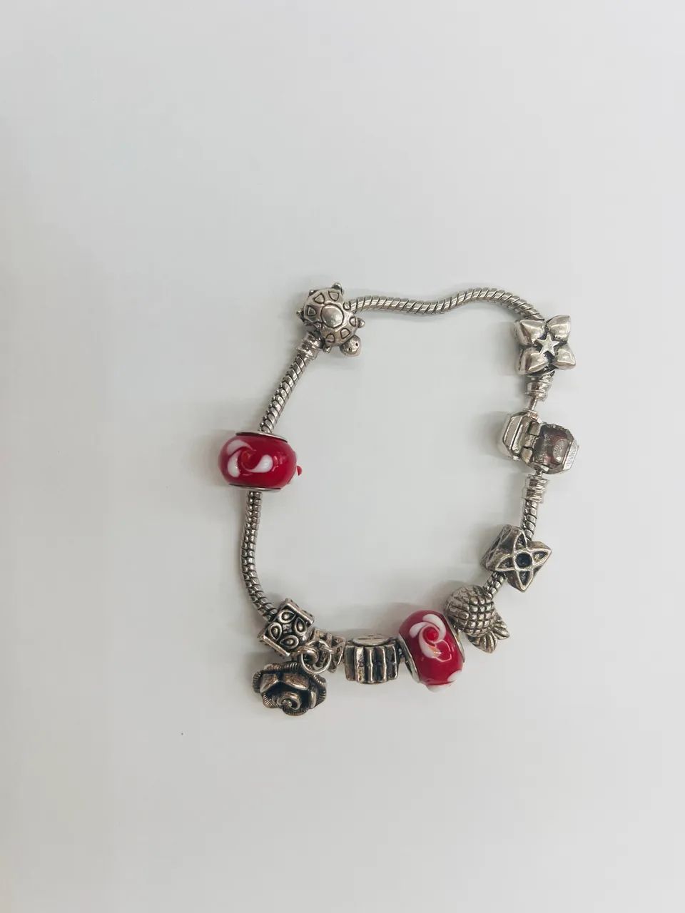 Pulseira de prata com berloques