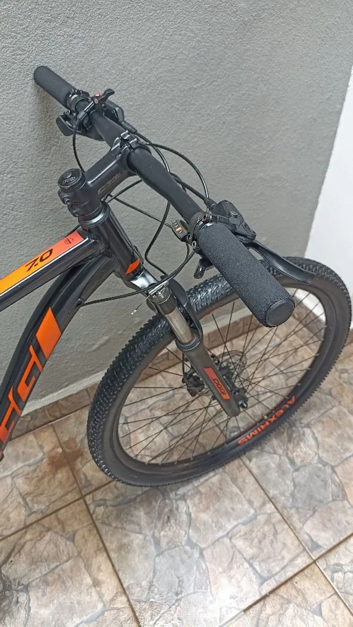 Bicicleta Oggi 7.0 aro 29 preta e laranja  - Foto 4