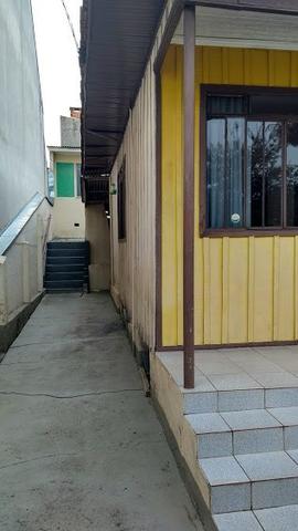 Terreno,com tres casas