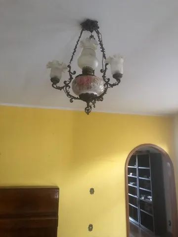 Lustre triplo estilo barroco.