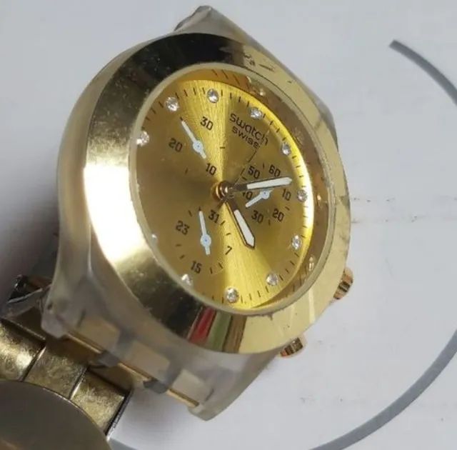 Relogio swatch dourado - Foto 4