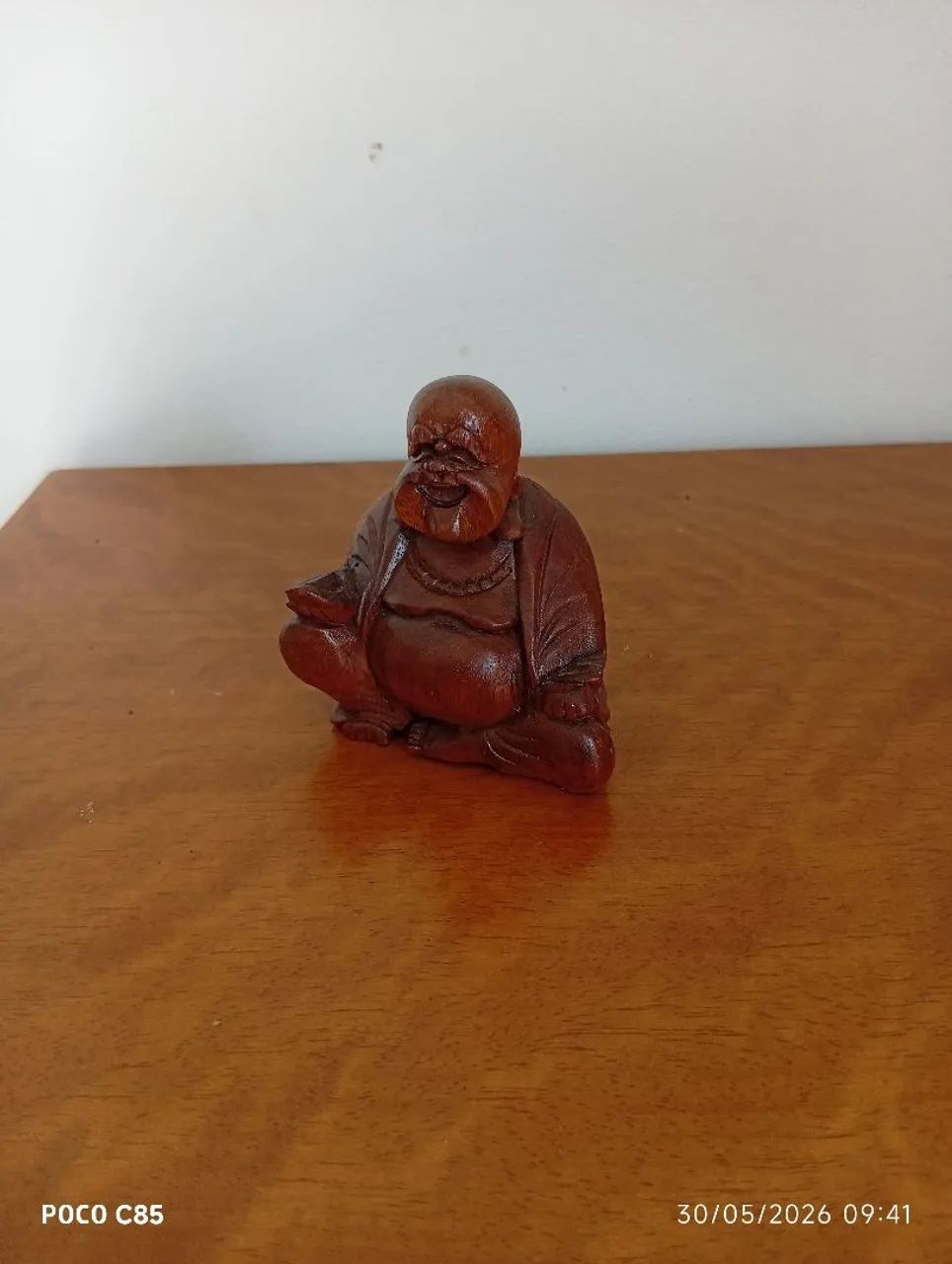 Buda em madeira 