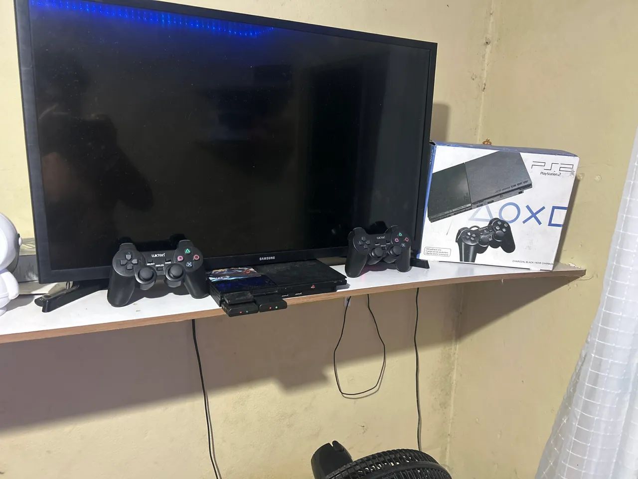 Ps2 zerado com caixa do play