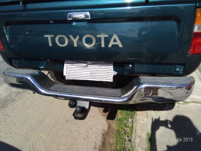 Pick-up, Toyota hilux, verde, bem conservada - Foto 4