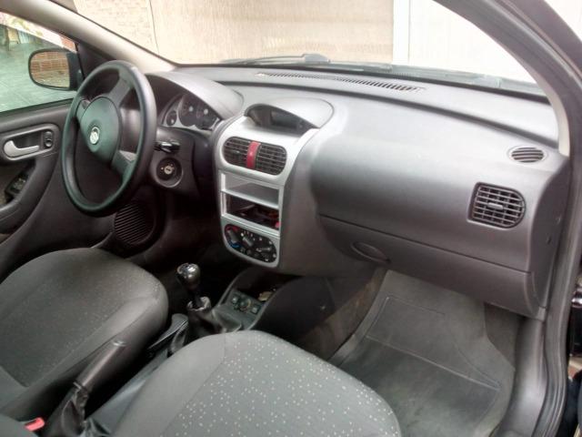 Corsa sedan 2010 - Foto 3