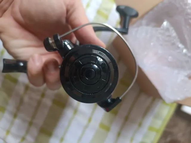 Molinete para pesca Serie 4000 novo na caixa - Foto 5