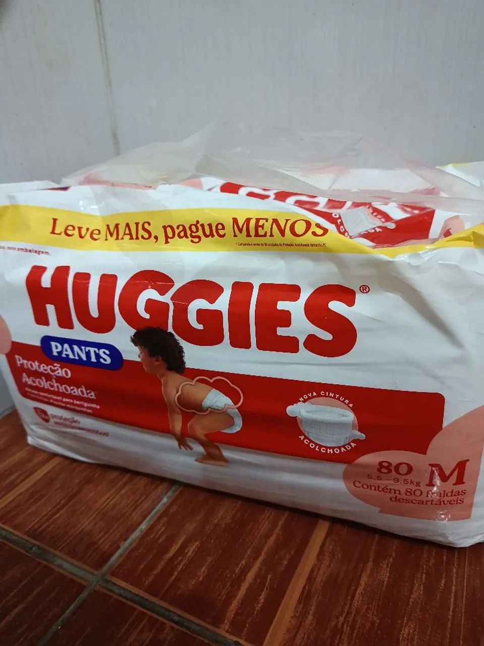 Fralda Huggies M 
