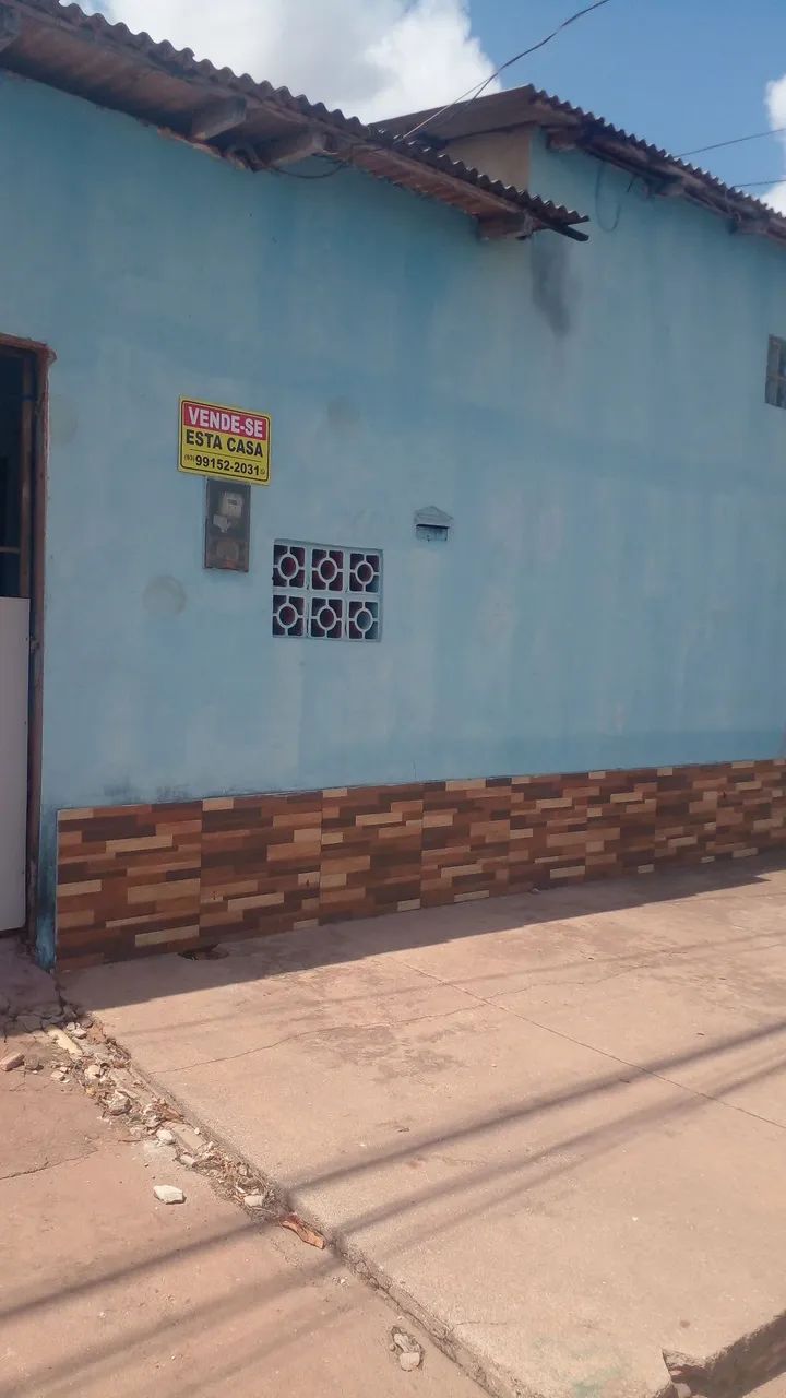 terreno com casa dentro