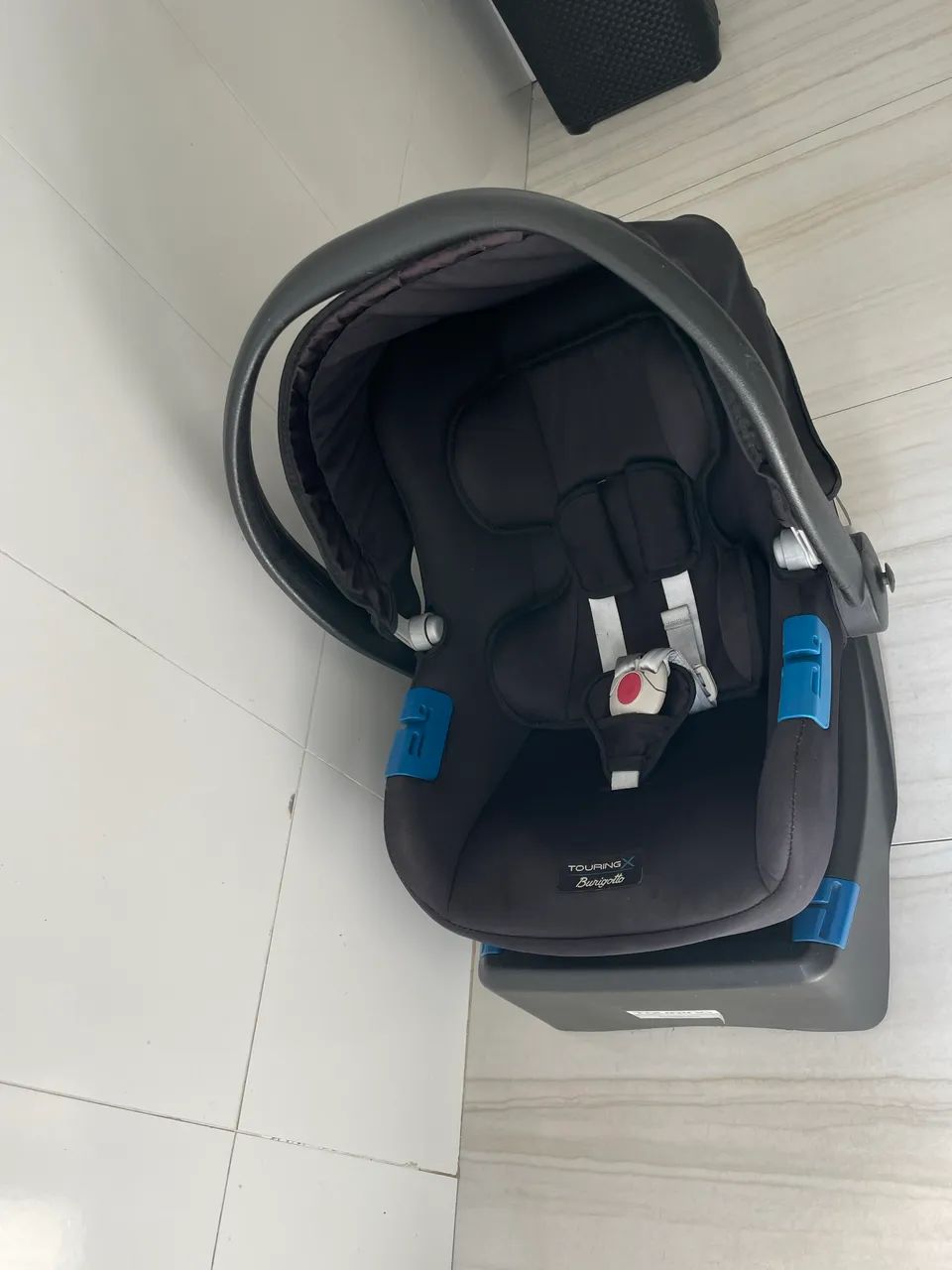 Bebê conforto com a base 