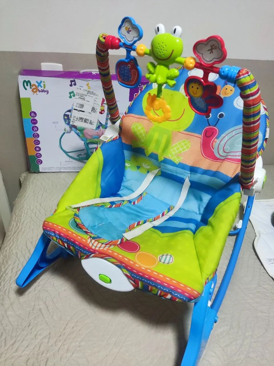 Cadeirinha de apoio massageadora