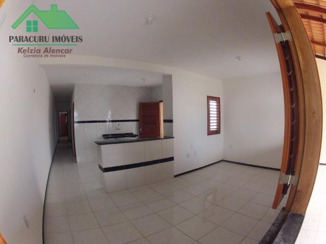 Ampla casa nova de três quartos financiada em Paracuru - Foto 4