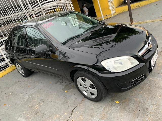 Prisma lt 1.4 2011 completo 3 mil de entrada - Foto 11