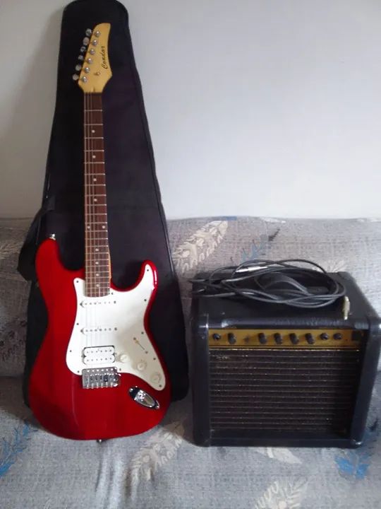Guitarra condor e Caixa amplificada 