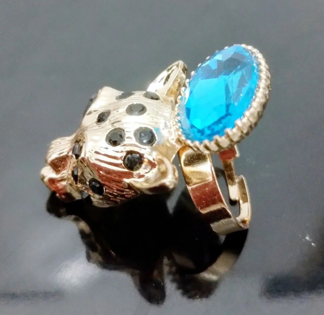 Anel leopardo com pedra azul.  - Foto 4