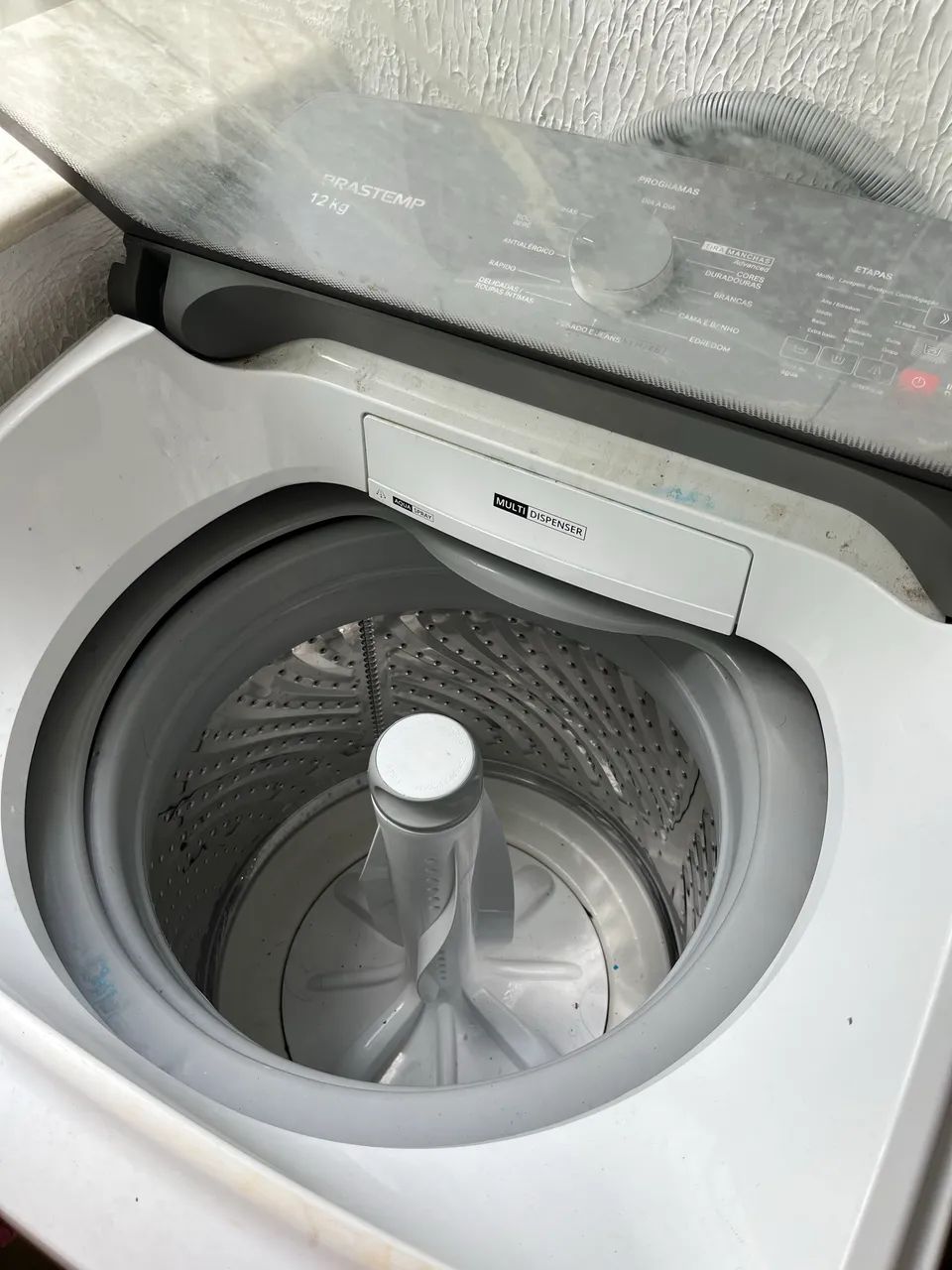 Máquina de lavar com defeito
