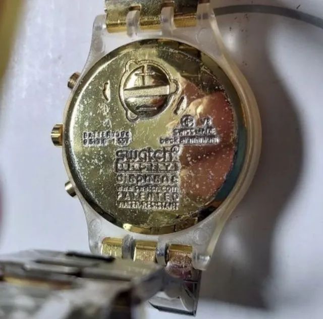 Relogio swatch dourado - Foto 5