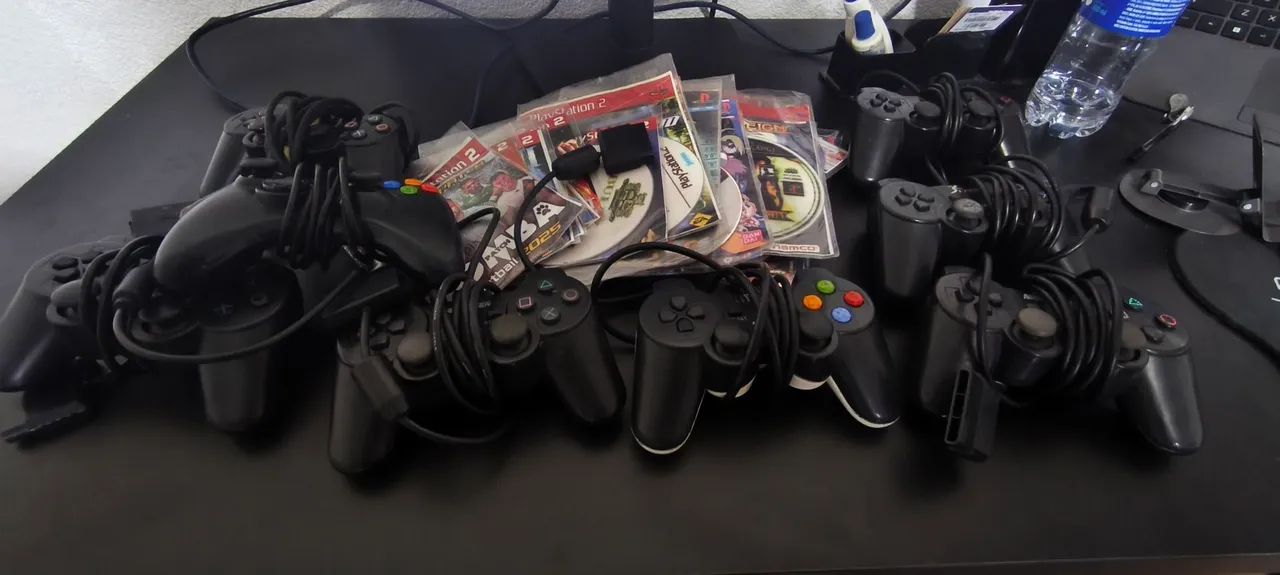 8 CONTROLES E 30 JOGOS PS2 - Foto 2