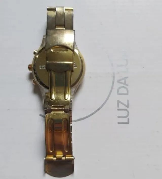 Relogio swatch dourado - Foto 3