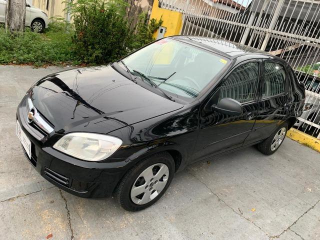 Prisma lt 1.4 2011 completo 3 mil de entrada