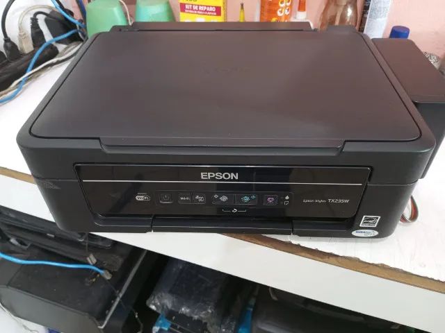 Impressora Epson TX235W com defeit.