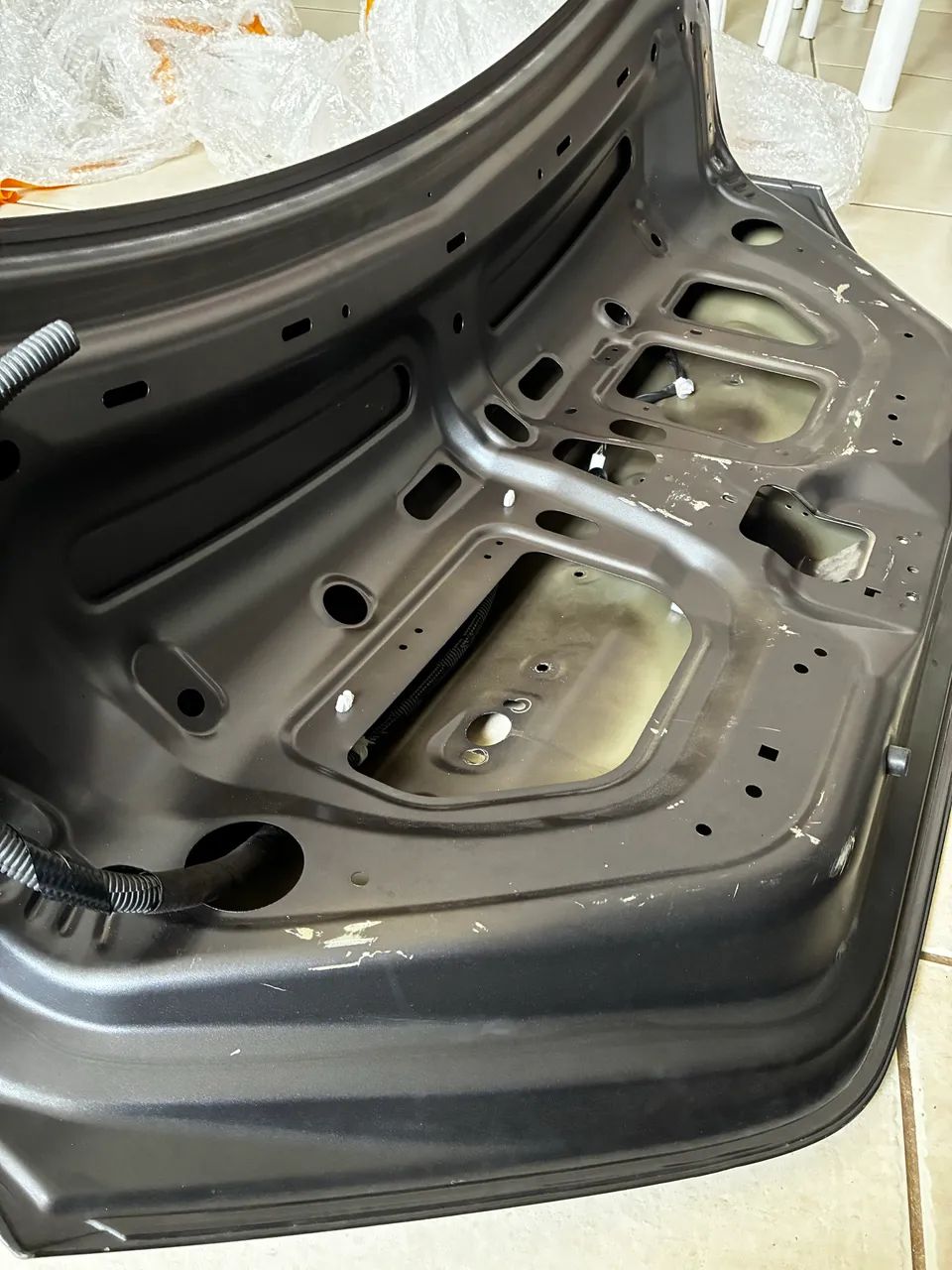 Tampa Porta-Malas Nissan Versa  - Foto 4