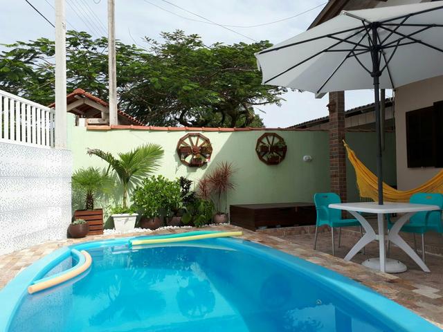 Belíssima casa com piscina em Matinhos - Foto 9