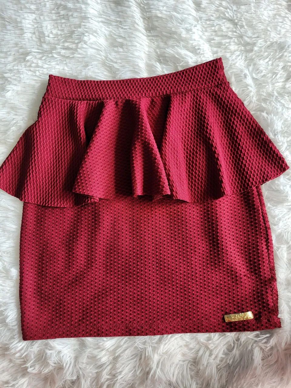 Saia tamanho P/M ela estica