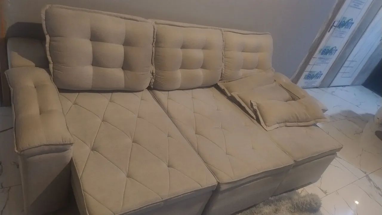 Vendo sofá retrátil semi novo 