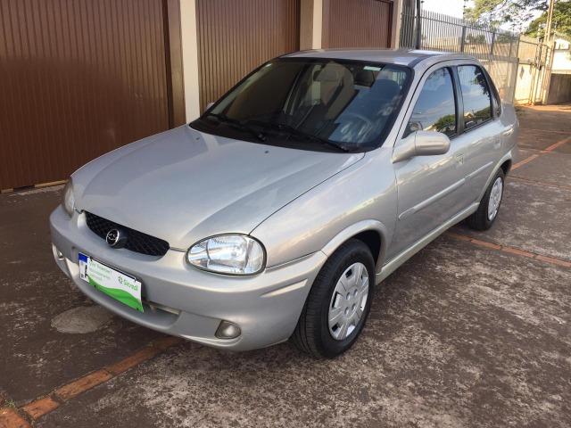 Gm/corsa sedan classic 1.0 (vidro,trava, alarme e som )
