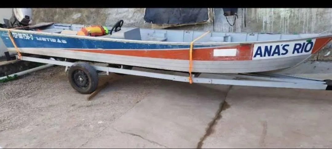Motor popa 25 Hp com barco 6 mtr, carretinha emplacada .
