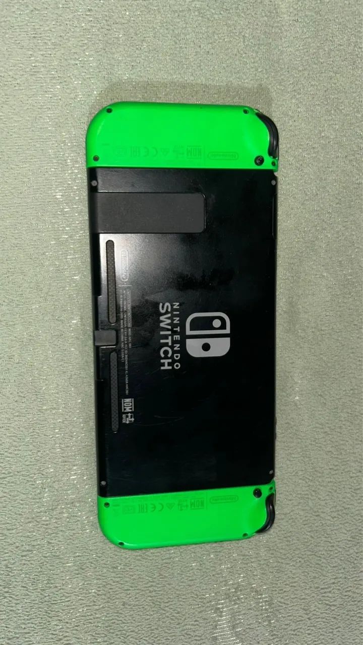 Nintendo Switch + 3 jogos (Zelda, Smash e Pokémon) - Completo