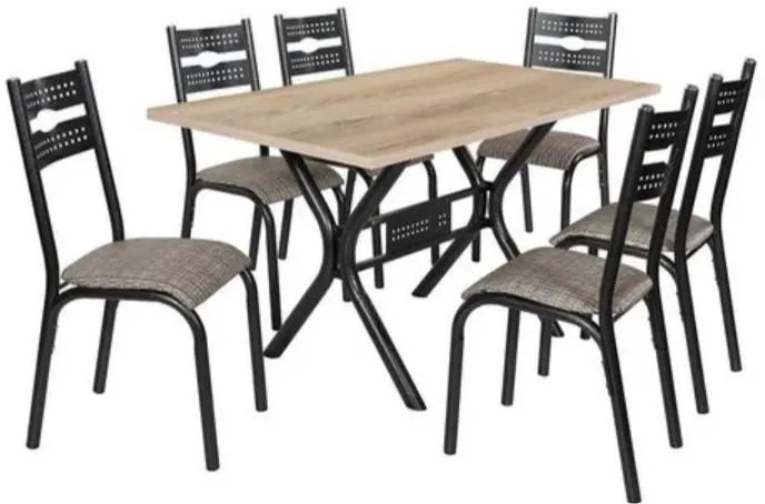 Mesa nova e nunca usada com quatro cadeiras. 