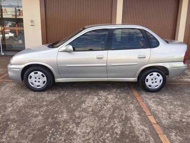 Gm/corsa sedan classic 1.0 (vidro,trava, alarme e som ) - Foto 4