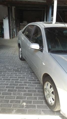 Focus Ghia sedan automático com teto solar - Foto 11
