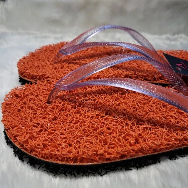 Chinelo massageador