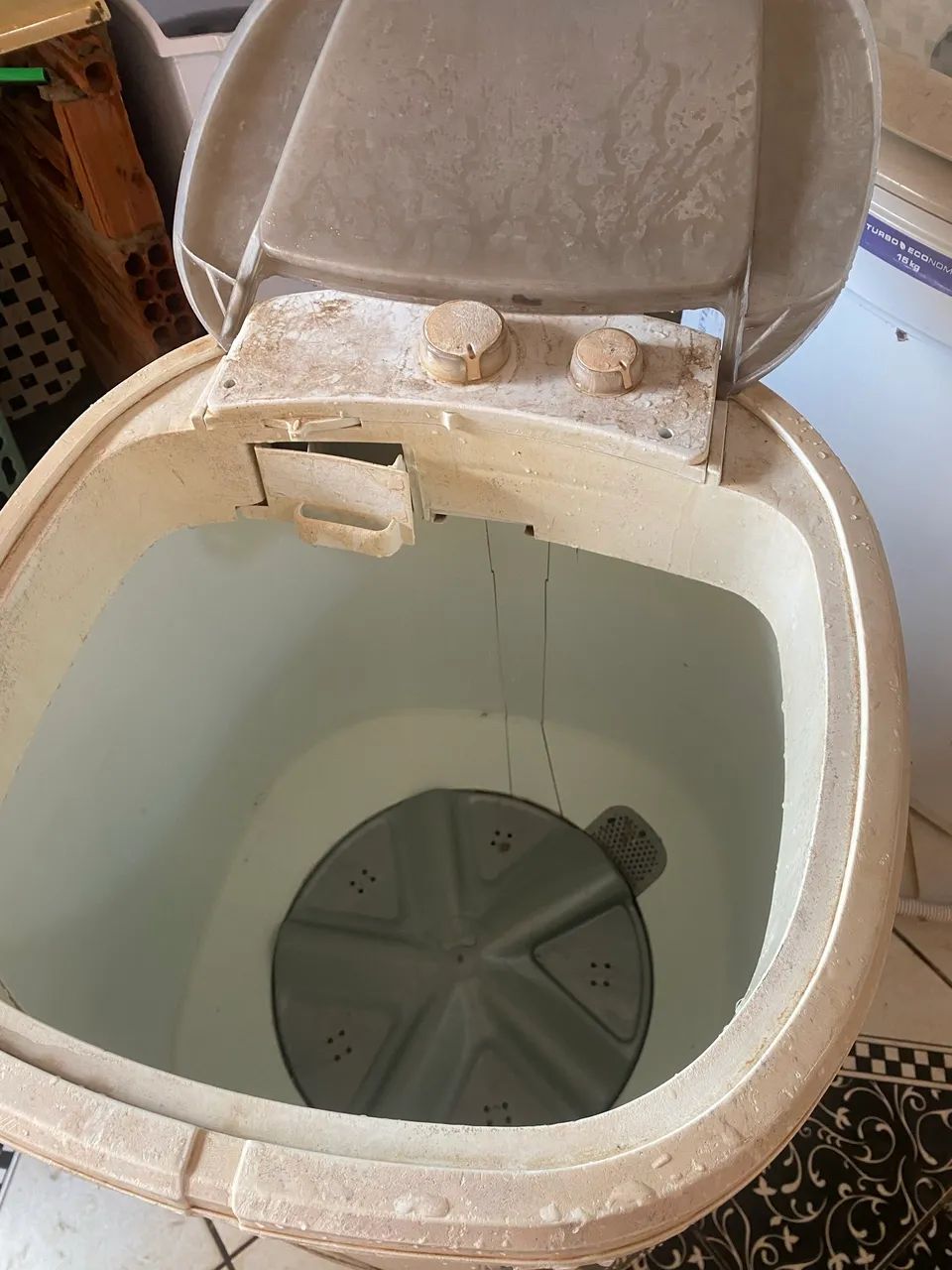 Máquina de lavar usada