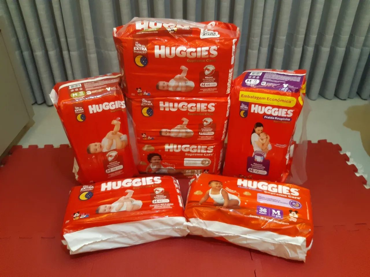 Combo 5 pacotes Fraldas + 2 pacotes Fraldas roupinha - todos Huggies Supreme Care M
